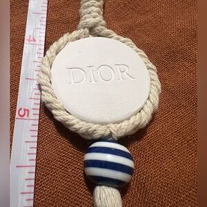 Dior perfume pendant
